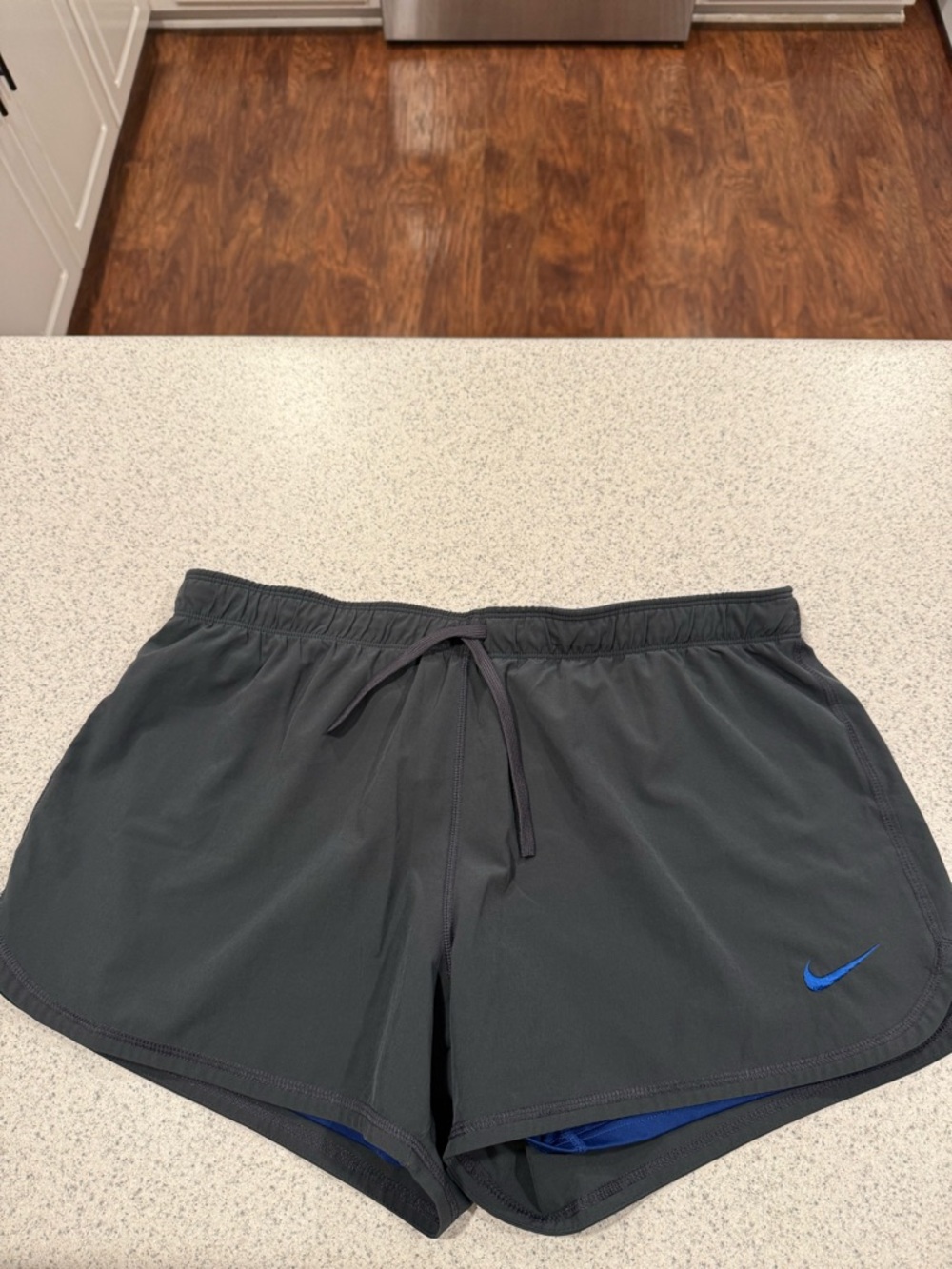 Nike Women's Charcoal Athletic Shorts with Blue Swoosh